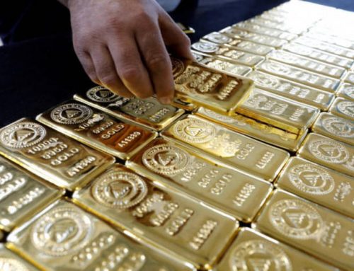 Gold slips as solid jobs data spurs rate hike bets